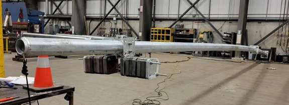 Pole with damper assembly